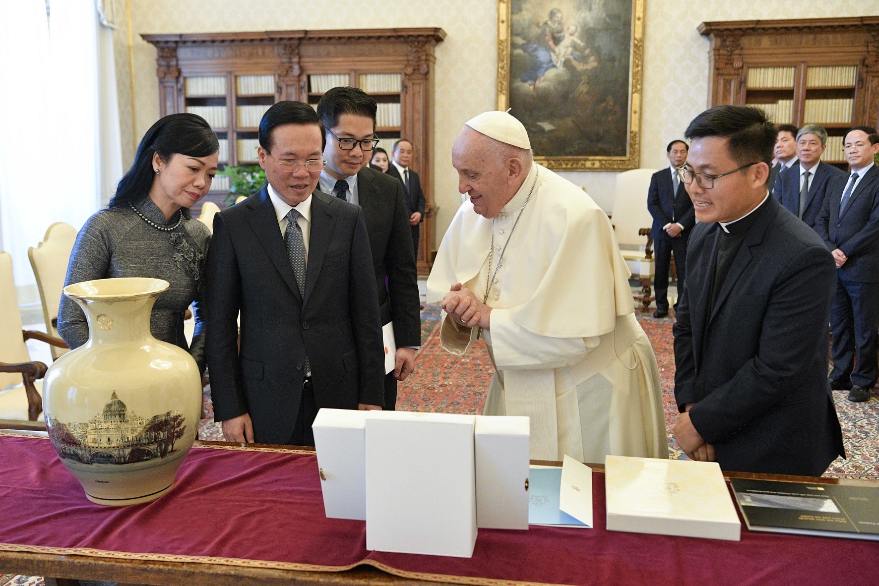 Pope Francis presents gifts to Vietnamese President Vo Van Thuong and First Lady Phan Thi Thanh Tam during a meeting at the Vatican July 27, 2023. (CNS photo/Vatican Media)